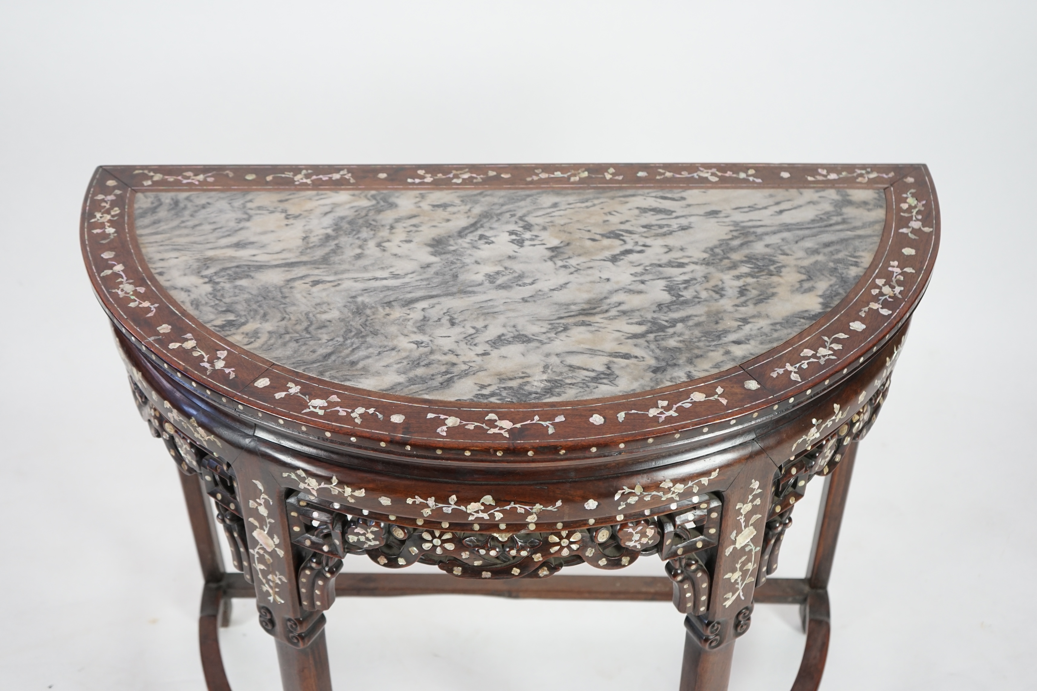 A Chinese hongmu and floral mother of pearl inlaid console table, late 19th/early 20th century